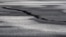 A road is damaged in the village of Grindavik, which was evacuated due to volcanic activity, in Iceland, Nov. 14, 2023. 