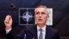 NATO Secretary General Jens Stoltenberg holds a gavel as he attends a meeting of the North Atlantic Council in the NATO defense ministers' session at the Alliance's headquarters in Brussels, Belgium, Feb. 15, 2024.