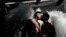 Men wearing angel wings share a kiss in downtown Buenos Aires, Argentina, Nov. 4, 2023, where thousands have gathered to commemorate the 32nd annual Pride Parade. 