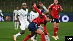 Zambia's Barbra Banda (L) fights for the ball with Costa Rica's Melissa Herrera (R) during their World Cup football match at Waikato Stadium in Hamilton on July 31, 2023.