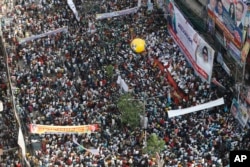 FILE - Activists of the Bangladesh Nationalist Party participate in a rally demanding the resignation of Prime Minister Sheikh Hasina, in Dhaka, Bangladesh, Oct. 28, 2023.