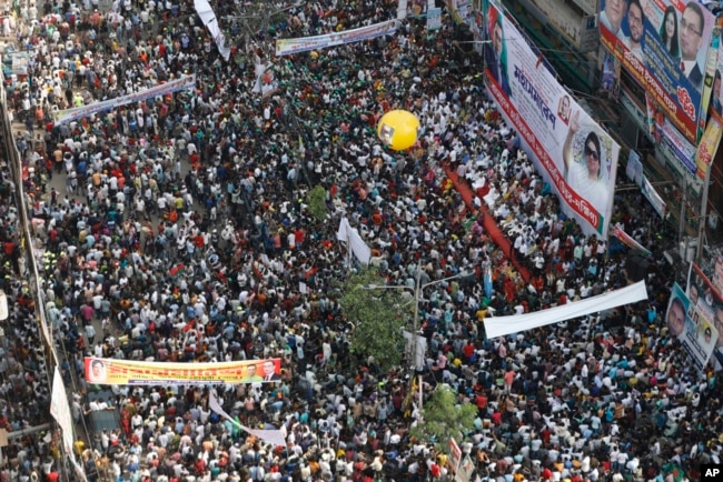 FILE - Activists of the Bangladesh Nationalist Party participate in a rally demanding the resignation of Prime Minister Sheikh Hasina, in Dhaka, Bangladesh, Oct. 28, 2023.