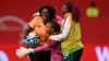 FILE - Zambia's goalkeeper Catherine Musonda (C) celebrates with her team after winning the International friendly football match Germany vs Zambia in Fuerth, southern Germany, on July 7, 2023, ahead of the FIFA Women's World Cup.