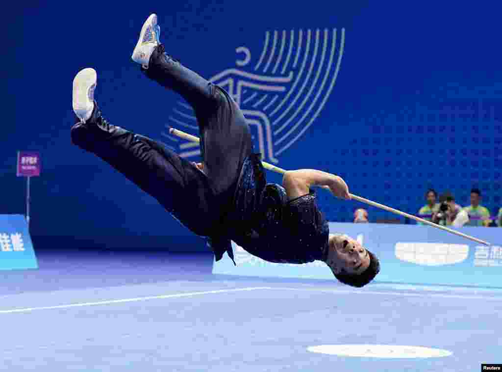 China's Chang Zhizhao is seen in action during the Men's Gunshu Final, at the Asian Games, in Hangzhou, China. 