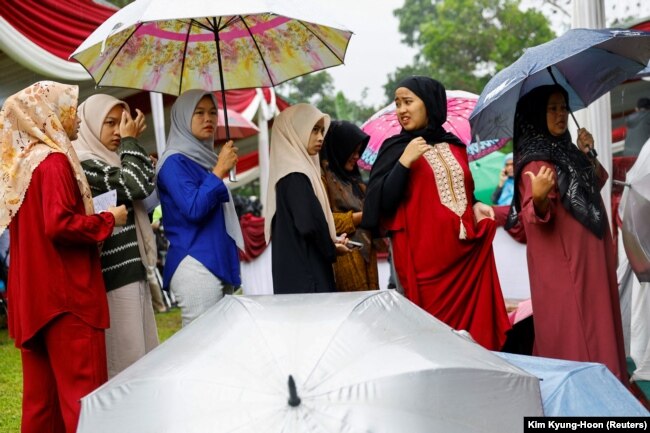 Antrean di TPS saat pemilihan umum di Bogor, Jawa Barat, 14 Februari 2024. (Foto: REUTERS/Kim Kyung-Hoon)