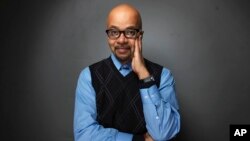 FILE - Author James McBride poses for a portrait during the 2012 Sundance Film Festival in Park City, Utah, Jan. 23, 2012.