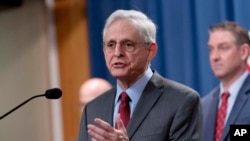 Attorney General Merrick Garland speaks during a news conference at the Department of Justice headquarters in Washington, June 27, 2024. The Justice Department has charged nearly 200 people in a sweeping crackdown on health care fraud schemes.