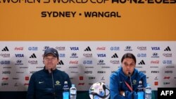 Australian women's football coach Tony Gustavsson (L) and Australia's forward Sam Kerr take part in a press conference at Stadium Australia in Sydney on July 19, 2023, on the eve of the Women's World Cup football match between Australia and Ireland. 