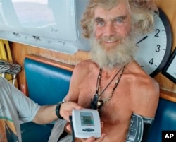 Australian Tim Shaddock has is blood pressure taken after being rescued by a Mexican tuna boat in international waters, in this July 12, 2023 photo provided by Grupomar/Atun Tuny.