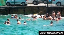 İstanbul'da aşırı sıcaklar nedeniyle sahiller denize girmek isteyenlerin akınına uğruyor