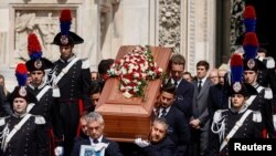 Pallbearers carry the coffin of former Italian Prime Minister Silvio Berlusconi during his state funeral at the Duomo Cathedral, in Milan.