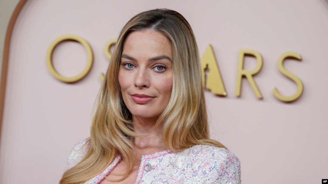 Margot Robbie arrives at the 96th Academy Awards Oscar nominees luncheon at the Beverly Hilton Hotel in Beverly Hills, California, Feb. 12, 2024.