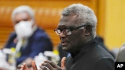 Visiting Solomon Islands Prime Minister Manasseh Sogavare speaks during a bilateral meeting with his Chinese counterpart Li Qiang at the Great Hall of the People in Beijing, July 10, 2023.