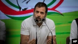 FILE - Indian opposition leader Rahul Gandhi addresses a press conference after being expelled from parliament in New Delhi, India, March 25, 2023.