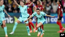 Australia's Hayley Raso, right, celebrates after scoring her team's second goal during the Women's World Cup Group B soccer match between Australia and Canada in Melbourne, Australia, July 31, 2023.