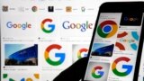 In this file photo, various Google logos are displayed on a Google search, Monday, Sept. 11, 2023, in New York. (AP Photo/Richard Drew, File)