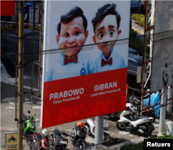 AI-generated cartoon images of presidential candidate Prabowo Subianto and his running mate Gibran Rakabuming Raka Photo credit: Reuters