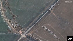 This satellite image provided by Maxar Technologies shows fortifications and dragons in Medvedivka, Crimea, Feb. 11, 2023.