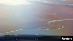 A view from a plane of the village of Grindavik, which was evacuated due to volcanic activity, near Grindavik, Iceland, Nov. 13, 2023.