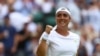 Tunisia's Ons Jabeur celebrates winning her fourth round match against Czech Republic's Petra Kvitova at the All England Lawn Tennis and Croquet Club, London, Britain on July 10, 2023