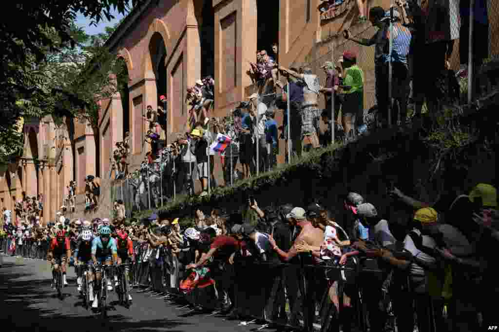 Riders compete during the 2nd stage of the 111th edition of the Tour de France cycling race, 199 km between Cesenatico and Bologna, in Italy.