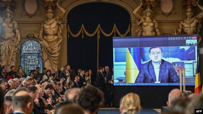 Ukrainian Foreign Minister Dmytro Kuleba addresses the Black Sea Security Conference under the auspices of Crimea International Platform via video link in Bucharest, Romania, April 13, 2023. 