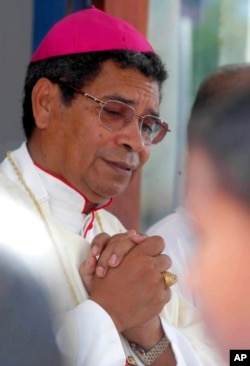 FILE - Roman Catholic Bishop Carlos Ximenes Belo leads a Mass in Baucau hospital, east of Dili, East Timor, July 26, 2003. The Vatican acknowledged in 2022 that Belo had sexually abused young boys.