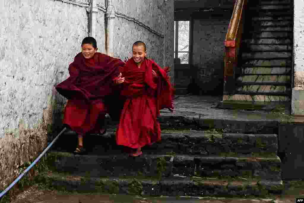 Young Buddhist monks play between prayers at the Tawang monastery in Tawang town in northeast Indian state of Arunachal Pradesh.