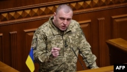 FILE - Vasyl Maliuk, then-acting head of Ukraine's Security Service (SBU), addresses members of Ukraine's Parliament in Kyiv, Feb. 7, 2023. Maliuk has condemned a recent incident of SBU surveillance of investigative journalists, promising internal measures in response.