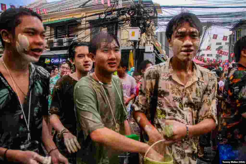 Din-Sor-Pong, is the white limestone powder paste that is used during Songkran in Bangkook, April 13, 2024. People tend to add the paste to their face as a cool effect but also can be used for celebratory purposes.
