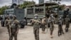 Soldiers of the Kenya Defense Forces are deployed at a stadium ahead of a planned demonstration called after a nationwide deadly protest against a now-withdrawn tax bill left over 20 dead in downtown Nairobi, on June 27, 2024.