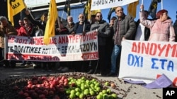 Protesting farmers with their tractors take part in a rally outside the annual Agrotica trade fair in the port city of Thessaloniki, northern Greece, Feb. 3, 2024.
