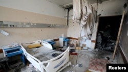 Debris lies on the floor as rescuers and medics search for dead bodies inside the damaged Al-Shifa Hospital, amid the ongoing conflict between Israel and Palestinian Islamist group Hamas, in Gaza City, April 8, 2024.