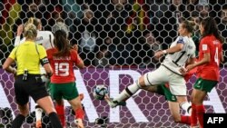 Germany's Alexandra Popp (#11) scores her team's fifth goal during the World Cup Group H football match between Germany and Morocco at Melbourne Rectangular Stadium, also known as AAMI Park, in Melbourne on July 24, 2023.