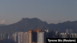 Lokasi pembangunan gedung perumahan di Hong Kong, China, 24 Oktober 2023. (Foto: REUTERS/Tyrone Siu)