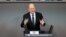 German Chancellor Olaf Scholz speaks at the 2024 budget debate of the German lower house of parliament, the Bundestag, in Berlin, Germany, Jan. 31, 2024. 