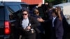 FILE - Republican presidential candidate former President Donald Trump is surrounded by Secret Service agents as he is taken to a vehicle at a campaign rally, July 13, 2024, in Butler, Pennsylvania.