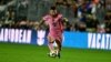 FILE - Inter Miami's Argentine forward #10 Lionel Messi vies for the ball during a friendly football match between Inter Miami CF and Newell’s Old Boys at DRV PNK Stadium in Fort Lauderdale, Florida, Feb. 15, 2024.