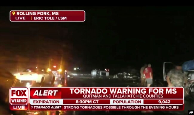 This screen grab from video broadcast by Fox Weather shows the immediate aftermath of severe weather in Rolling Fork, Miss., late Friday, March 24, 2023. (Fox Weather via AP)