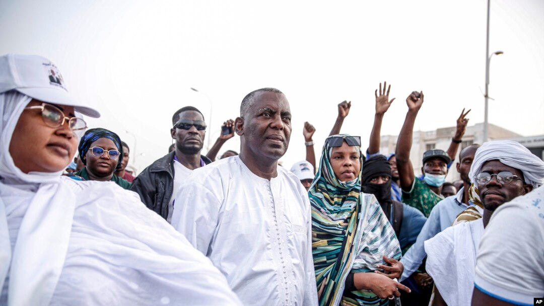 FILE - Presidential candidate Biram Ould Dah Ould Abeid, center, takes part in a rally among his supporters in Nouakchott, Mauritania, June 24, 2024. He is one of several candidates taking on the incumbent.