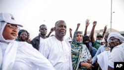 FILE - Presidential candidate Biram Ould Dah Ould Abeid, center, takes part in a rally among his supporters in Nouakchott, Mauritania, June 24, 2024. He is one of several candidates taking on the incumbent.