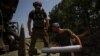 Ukrainian servicemen prepare to fire a 2S22 Bohdana self-propelled howitzer towards Russian troops at a position near the city of Bakhmut in Donetsk region, Ukraine, July 5, 2023.