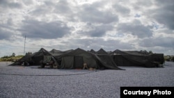 U.S. Marines execute command and control from a combat operations center during Keen Edge 22 at Camp Hansen, Japan, Jan. 31, 2022. The U.S. and Japan finished Keen Edge 24, a biannual bilateral command post exercise, Feb. 8, 2024. (U.S. Marine Corps)