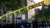 FILE - Police tape blocks the scene of a fatal shooting in Manhattan, New York, July 9, 2012.