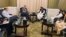 Zabihullah Mujahid of Afghanistan's Taliban government, center right, speaks with Russian envoy Zamir Kabulov in Doha, Qatar, June 30, 2024. The third round of talks on global engagement with the Taliban ended July 1. (Taliban spokesman's office via AP)