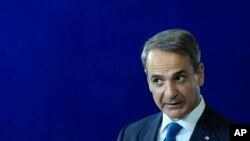 Perdana Menteri Yunani Kyriakos Mitsotakis dalam konferensi pers di kantor kanselir Jerman di Berlin, 14 November 2023. (AP/Markus Schreiber)