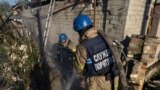 Firefighters extinguish a blaze after a Russian rocket attack in Kostiantynivka, Donetsk region, Ukraine, Sept. 27, 2023. 