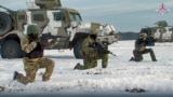 FILE - In this handout photo taken from video released by Russian Defense Ministry Press Service on Wednesday, Dec. 28, 2022, Russian troops take part in drills at an unspecified location in Belarus. (Russian Defense Ministry Press Service via AP)
