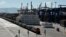 FILE - A freight train line at the port of Piraeus during its inauguration on June 20, 2014. Greece on Feb. 26, 2024, agreed to participate in and lead an EU security operation in the Red Sea, to protect commercial shipping from Houthi attacks. 