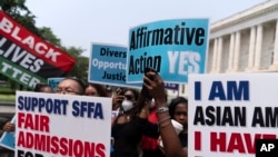 FILE - Demonstrators protest outside of the Supreme Court in Washington, DC on June 29, 2023, after the Supreme Court struck down affirmative action in college admissions, saying race cannot be a factor. (AP Photo/Jose Luis Magana, File)